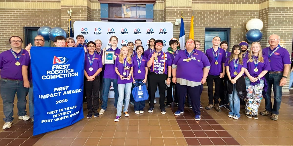 Project NEO Robotics team members stand together with medals, a trophy and a FIRST Impact Award banner at a competition in Fort Worth, Texas