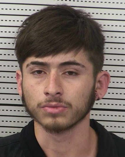 Booking photo of Oscar Sosa, a 19-year-old charged in a child abuse case involving an injured teen.