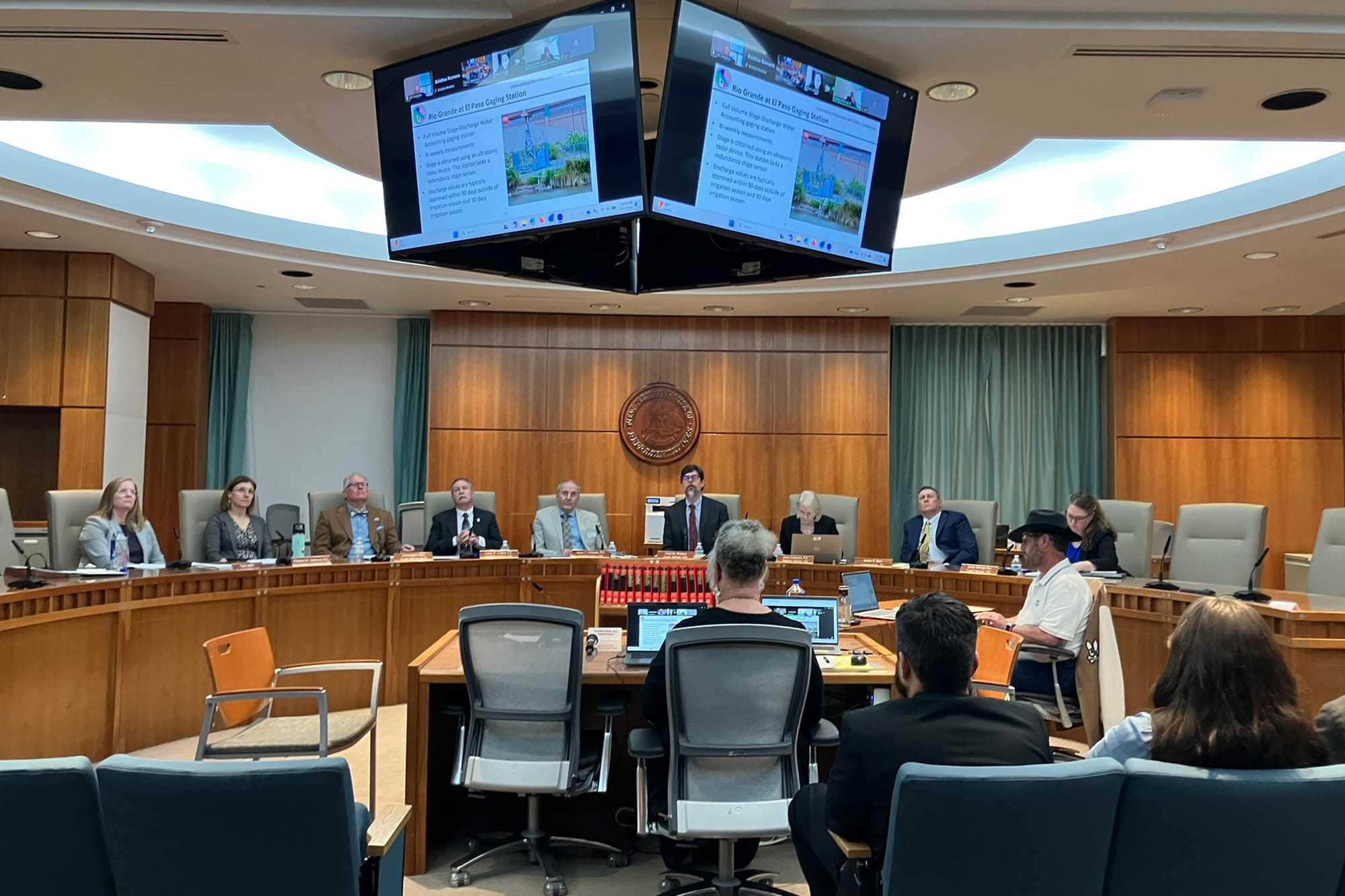 Members of the Rio Grande Compact Commission meet in a conference room in Santa Fe during an April 17 meeting on river flows and water conditions.
