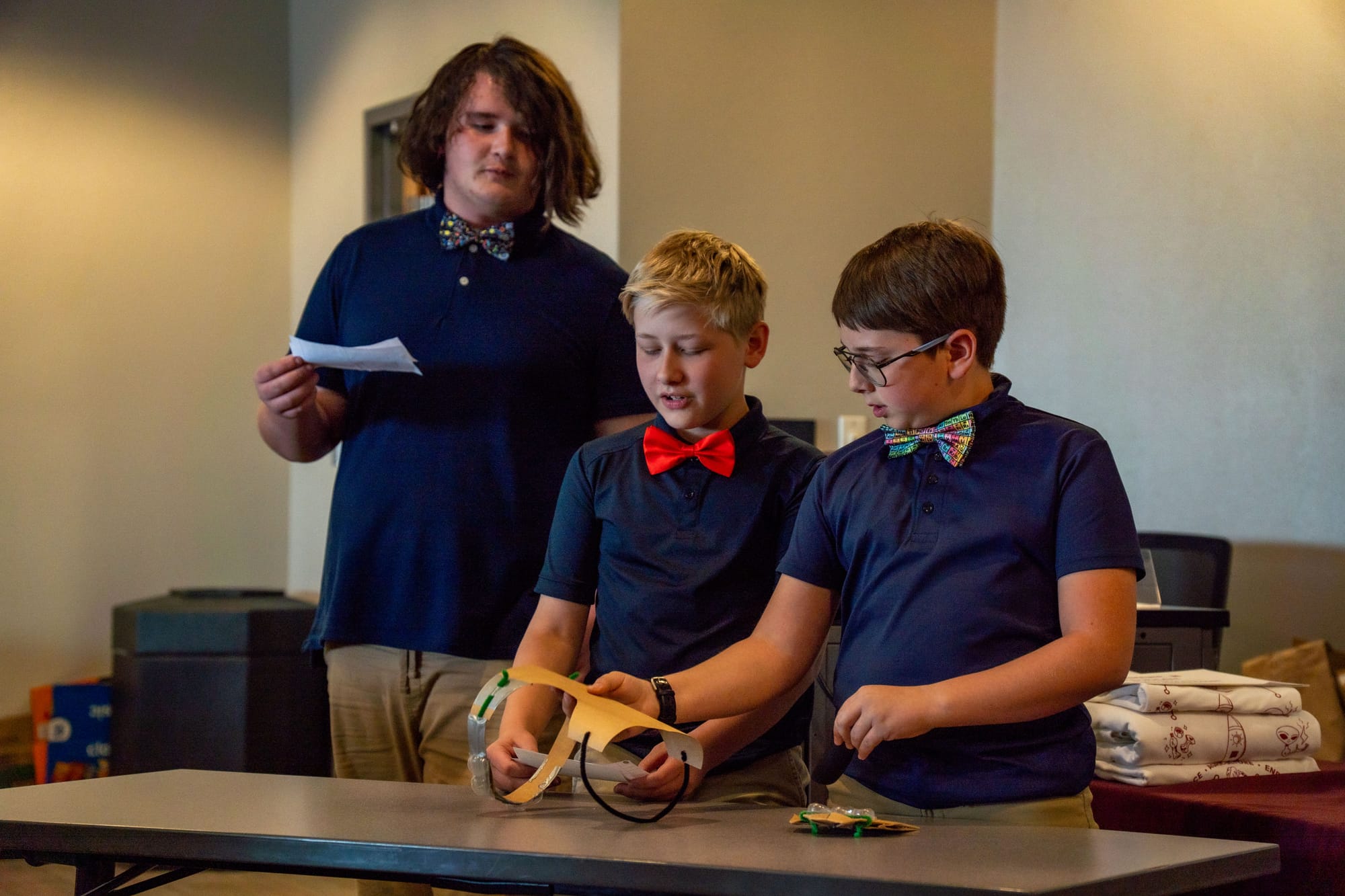 Students present a prototype during the Innoventure Challenge Finals at New Mexico State University.