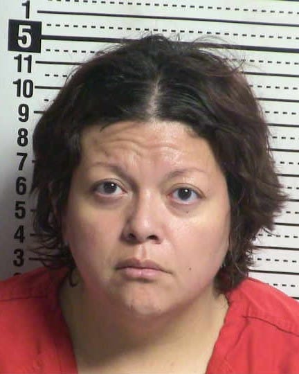 Booking photo of Robin Rios taken at the Doña Ana County Detention Center