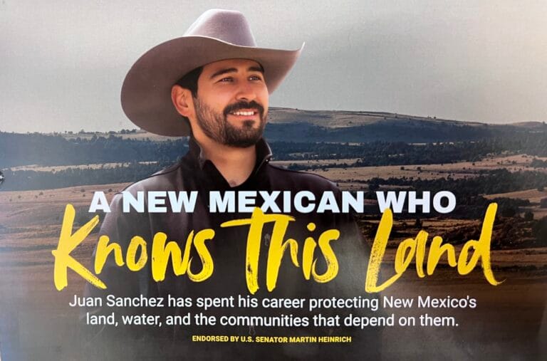 A campaign mailer supporting New Mexico land commissioner candidate Juan de Jesus Sanchez III features his photo over a landscape and the text, “A New Mexican who knows this land.”