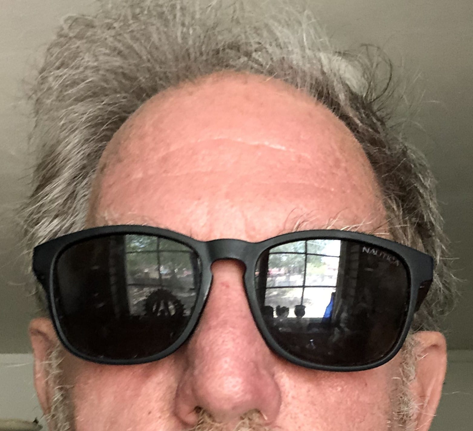 Jonathan E. “Jack” Davis wearing dark sunglasses