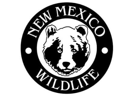 The New Mexico Department of Wildlife logo shows a black-and-white bear face inside a circular seal.