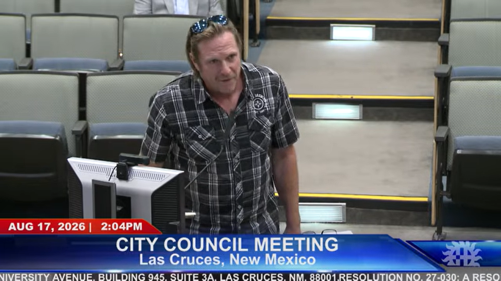 Santa Fe Brewing Co. owner and CEO Brian Lock speaks at a podium during the Aug. 17 Las Cruces City Council meeting.
