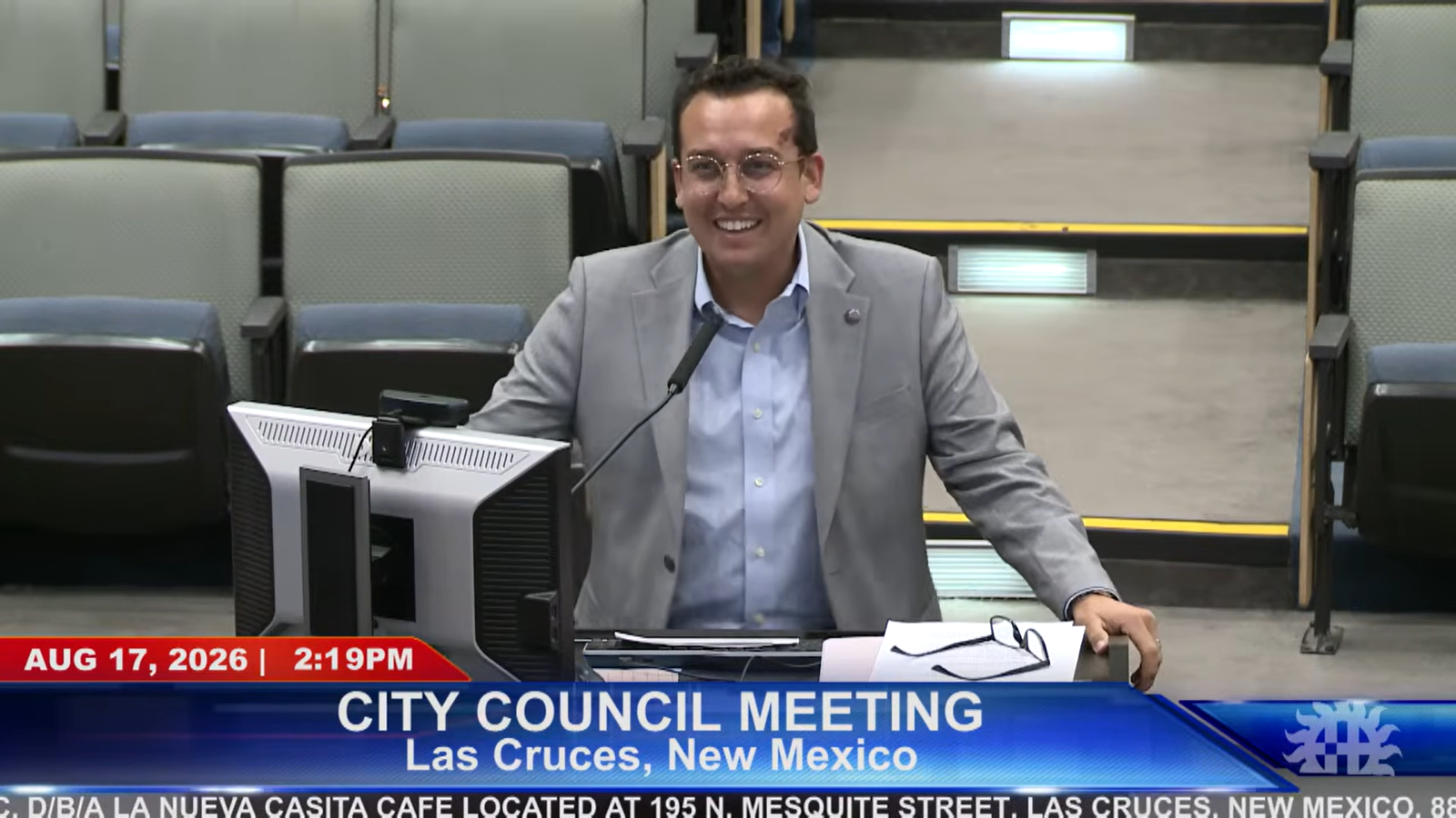 La Nueva Casita Cafe owner Israel Chávez smiles while speaking at the podium during the Aug. 17 Las Cruces City Council meeting.