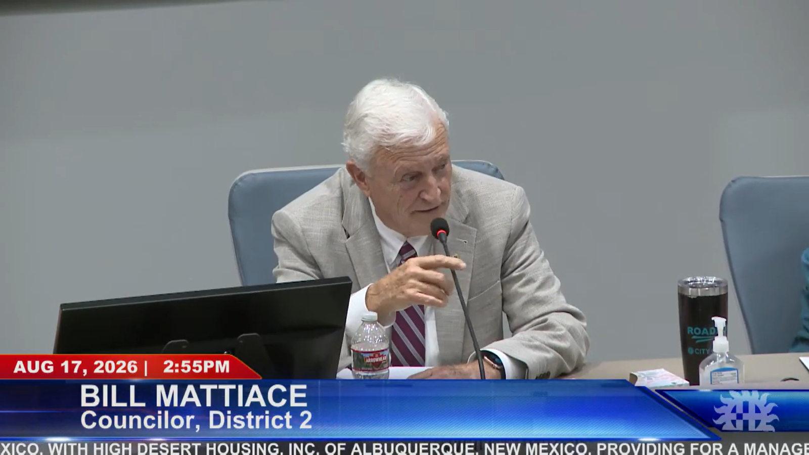 Las Cruces City Councilor Bill Mattiace speaks into a microphone during discussion of Amador Crossing at the Aug. 17 council meeting.