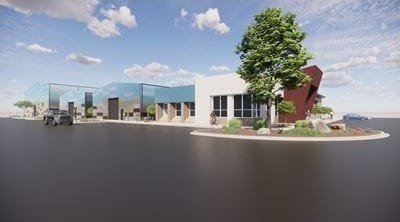Architectural rendering of the planned Arrowhead Studios complex at New Mexico State University, showing a modern low-rise production facility with landscaped grounds.