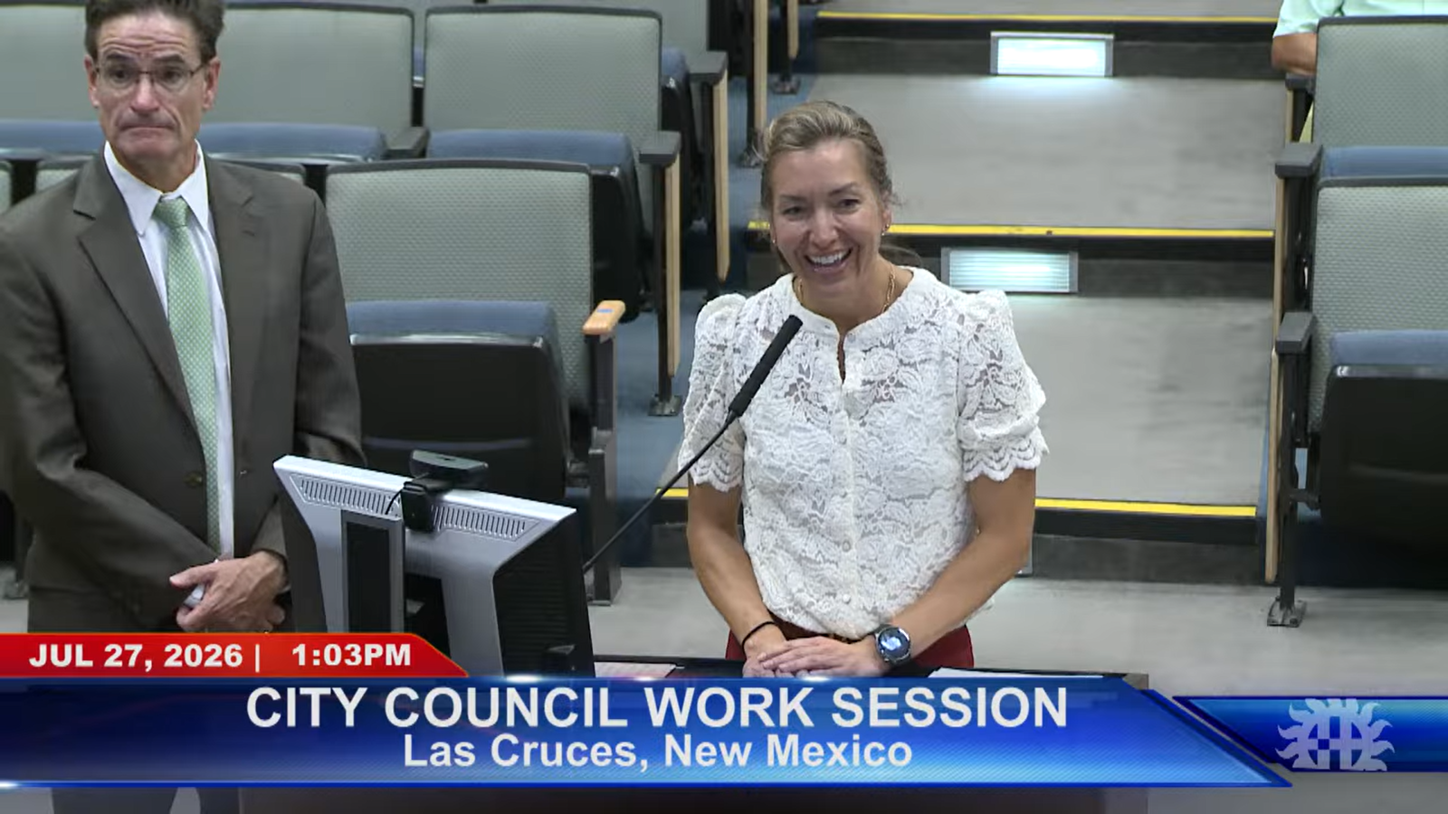 Teresa Magula of OIR Group speaks at the podium during a July 27 Las Cruces City Council work session.
