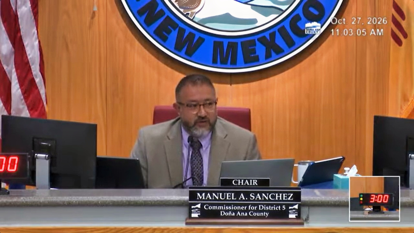 Doña Ana County Commission Chairman Manuel Sanchez speaks from the dais during the Oct. 27, 2026, meeting in Las Cruces.