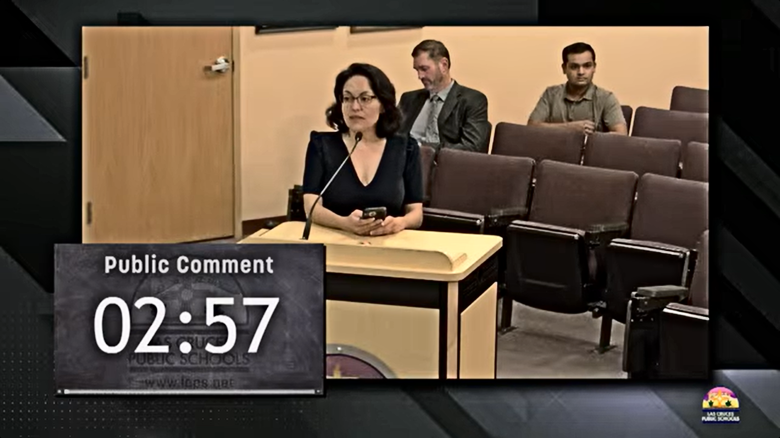 Sarah Mata, an Organ Mountain High School special education teacher, speaks at a podium during public comment at the Oct. 20 LCPS board meeting.