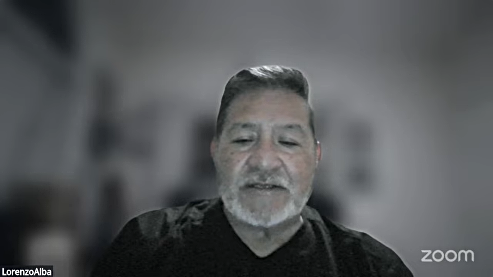 Casa de Peregrinos Executive Director Lorenzo Alba, wearing a dark shirt, speaks via Zoom during a Hatch Valley school board meeting.