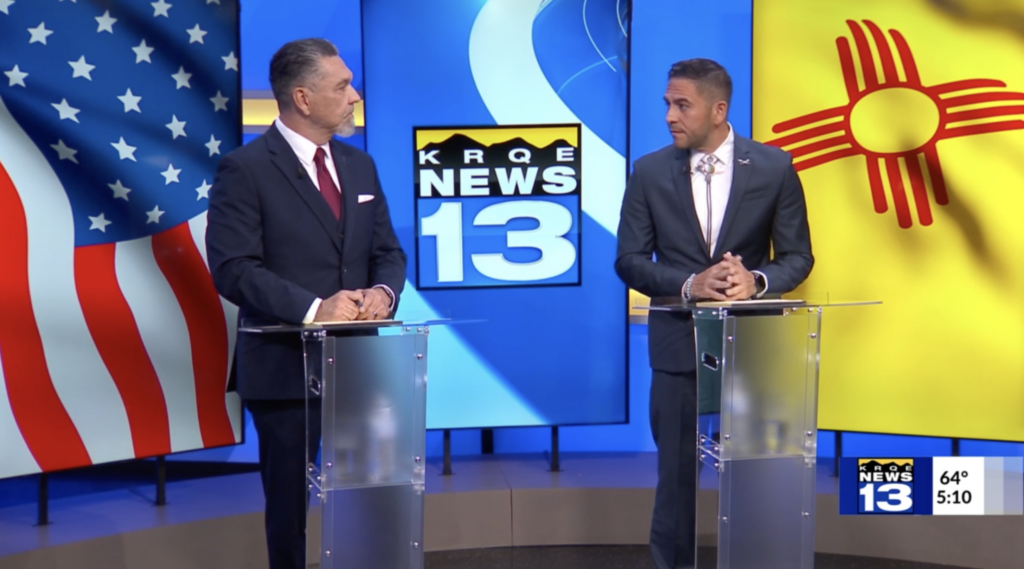 Republican Greg Cunningham, left, and Democratic U.S. Rep. Gabe Vasquez face each other at podiums during a KRQE News 13 congressional debate.