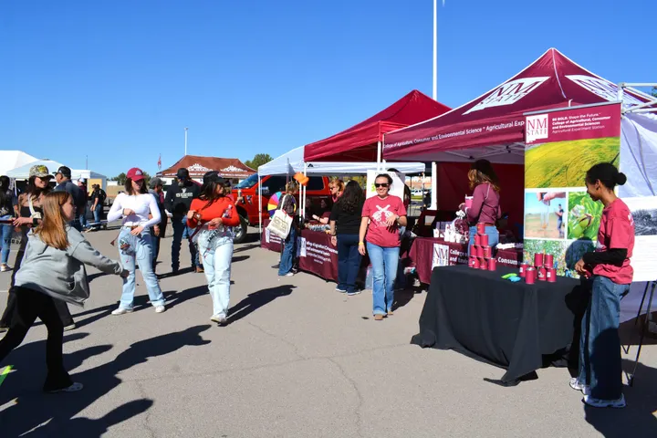 Visitors explore booths and activities during a past Ag Day outside the Pan American Center, hosted by NMSU’s College of Agricultural, Consumer and Environmental Sciences.