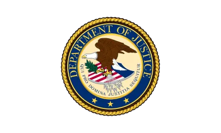 U.S. Department of Justice seal in gold and blue with an eagle emblem, centered on a black background.