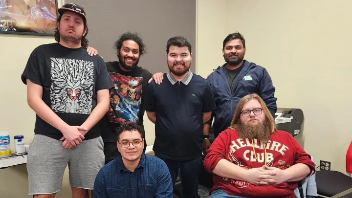 A group of six Doña Ana Community College students pose inside a classroom during the Global Game Jam weekend event.