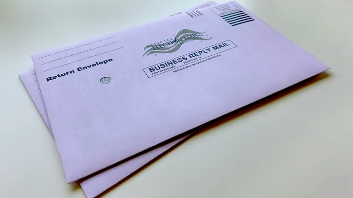 Official election mail envelopes used for absentee ballots and voter correspondence