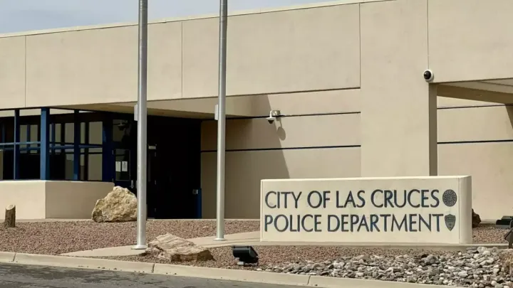 Exterior of the Las Cruces Police Department building with a sign identifying the agency in front.