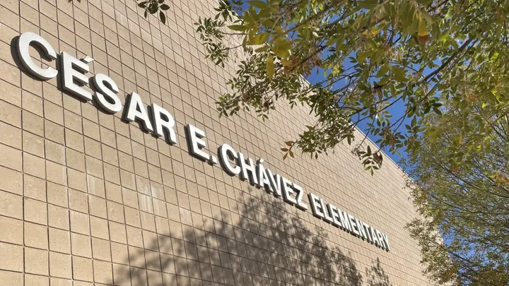 Exterior of Cesar E. Chavez Elementary School building in Las Cruces with the school name displayed on the wall
