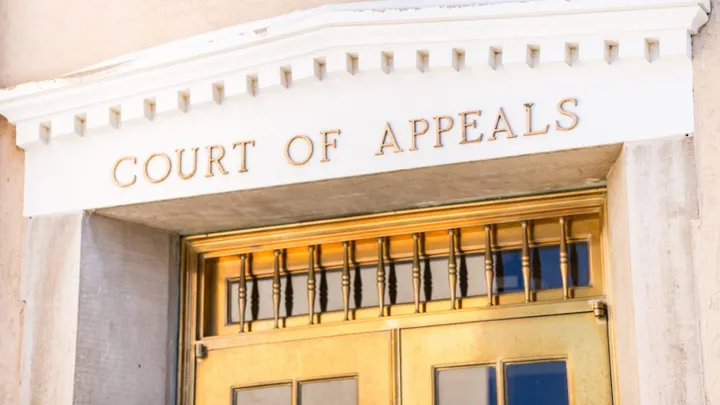 Entrance to the New Mexico Court of Appeals building with the words “Court of Appeals” above the doorway.