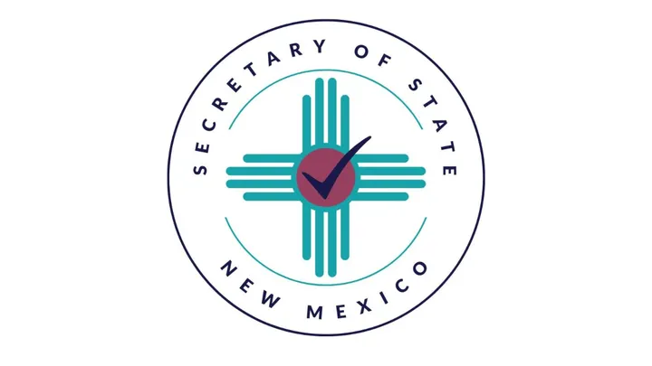 Logo of the New Mexico Secretary of State featuring a Zia symbol with a checkmark in the center.