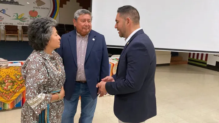 Pueblo of Acoma Gov. Charles Riley speaks with Cathy Riley and U.S. Rep. Gabe Vasquez during a town hall event.