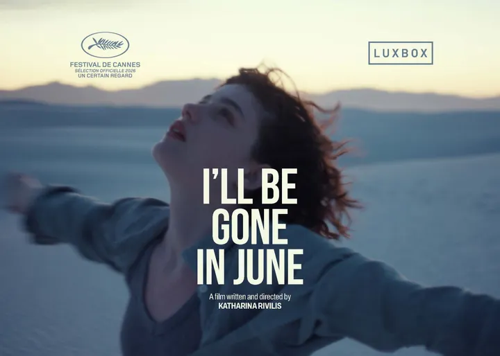 Promotional image for the film “I’ll Be Gone in June” showing a young woman in a desert landscape with Cannes Film Festival and Luxbox logos.