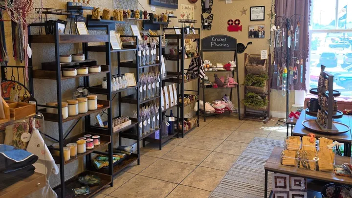 Shelves filled with candles, soaps, jewelry and handmade items inside Kandle Karma’s downtown Las Cruces shop.