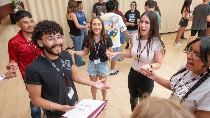 First-year NMSU students participate in a group team-building activity during the university’s 1888 Leadership Initiative program.