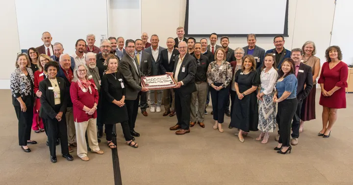 Group photo of NMSU Foundation leaders, donors and supporters celebrating the foundation surpassing $500 million in assets under management.