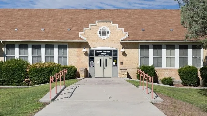 The front entrance of Frank O’Brien Papen Community Center in Las Cruces, with ramps leading to the doors.