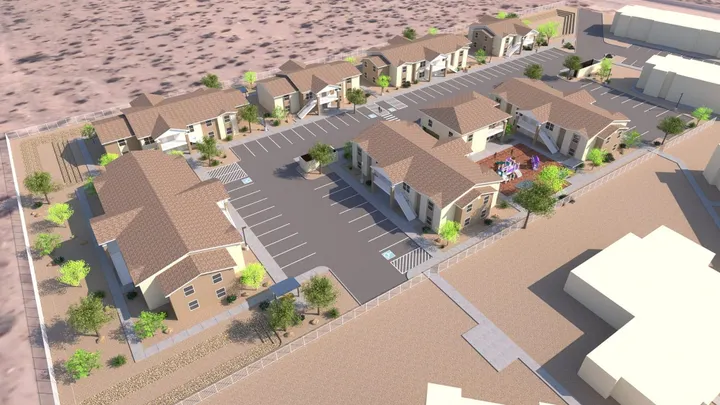 Rendering of the planned Desert Sun III housing development in Deming, showing apartment buildings, parking areas and a playground.