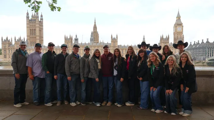 NMSU FFA and 4-H Leadership Team members and support staff pose near the Palace of Westminster during a trip to the United Kingdom.