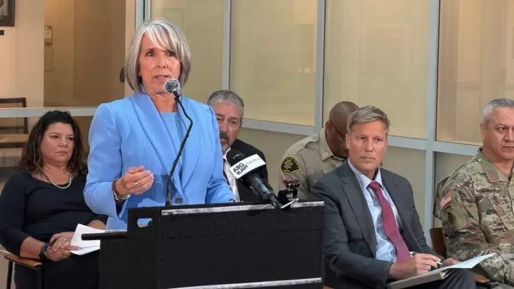 Gov. Michelle Lujan Grisham speaks at a news conference alongside state and local officials about allegations involving DEA fentanyl operations in New Mexico.