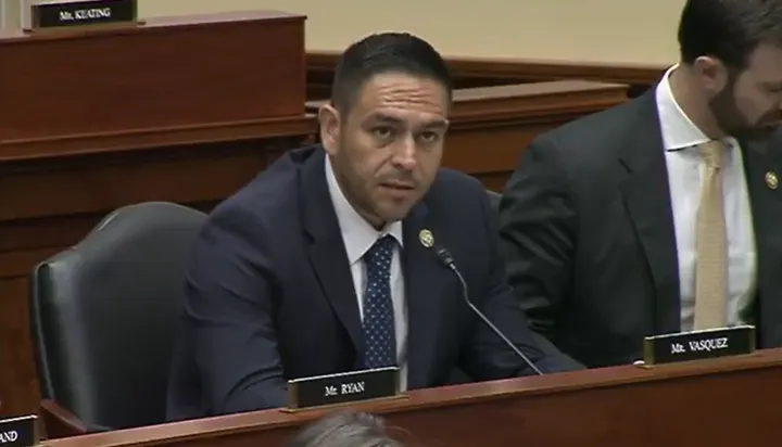U.S. Rep. Gabe Vasquez speaks into a microphone during a House committee meeting.