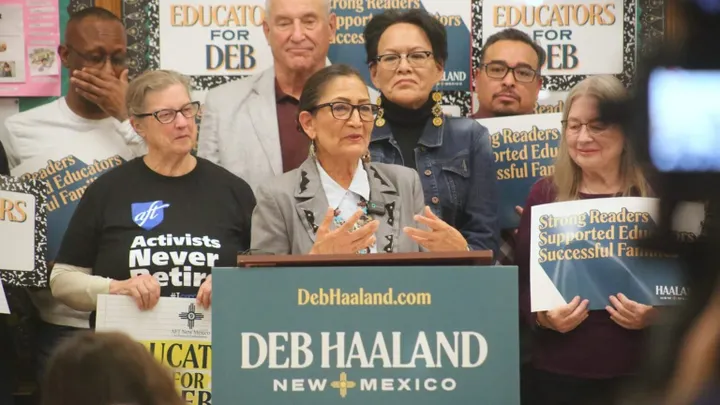 New Mexico Democratic gubernatorial candidate Deb Haaland speaks at a campaign event while standing near a microphone.