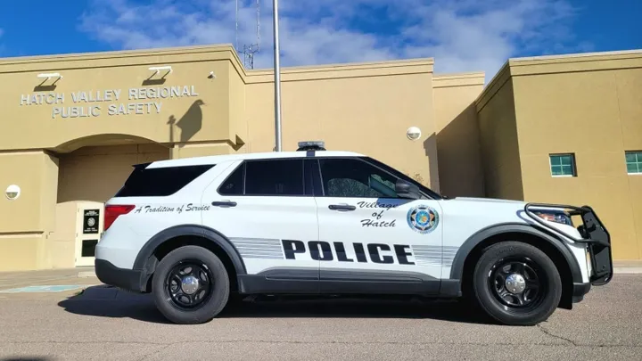 A Village of Hatch Police Department patrol SUV parked outside the Hatch Valley Regional Public Safety building.