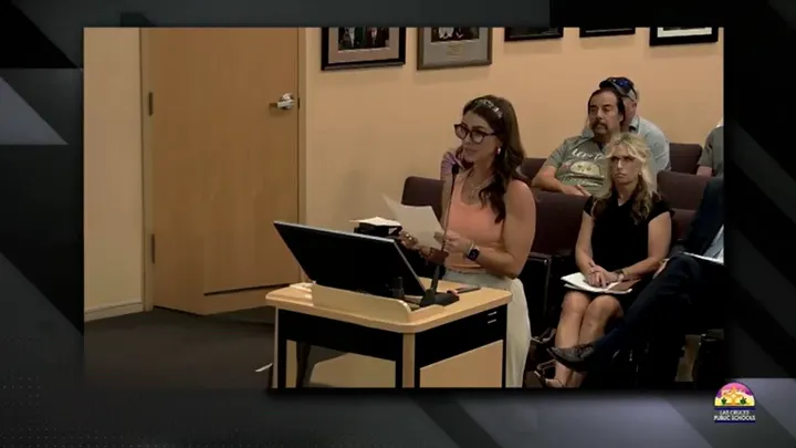 Kristen Chasteen speaks at a lectern during public comment at the Aug. 18 Las Cruces Public Schools Board of Education meeting.