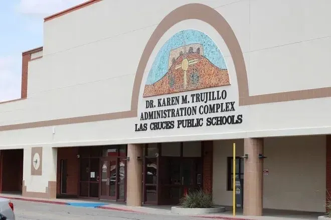 Exterior of the Dr. Karen M. Trujillo Administration Complex in Las Cruces, with the LCPS name displayed above the main entrance.