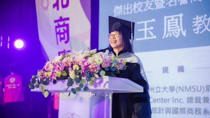 Winnie Lee is recognized during a ceremony at National Taipei University of Business in Taipei, Taiwan.