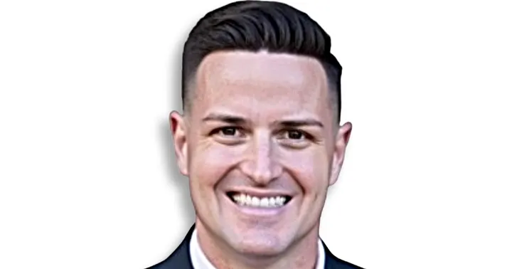 Former Doña Ana County Manager Scott Andrews smiles against a white background.