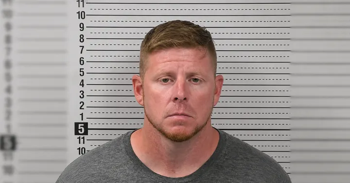 Booking photo of Wyatt Cornelius, 43, facing forward in front of a height chart at the Doña Ana County Detention Center.