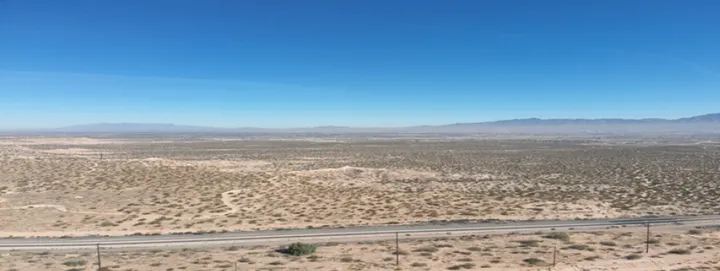 Wide desert landscape view of undeveloped land included with Sunland Park’s Rancho Santa Teresa annexation materials.