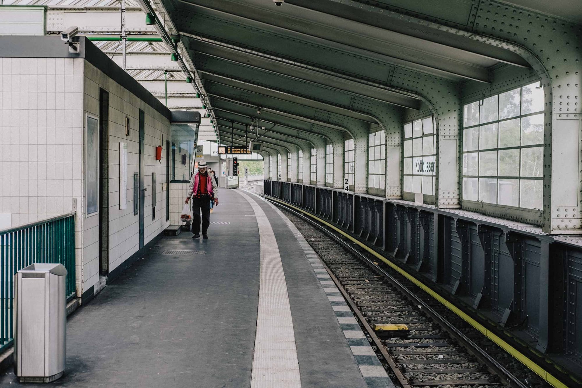 Person walking through the Kottbusser Tor U-Bahn station in Berlin photographed with the Fujifilm XF35mm f2