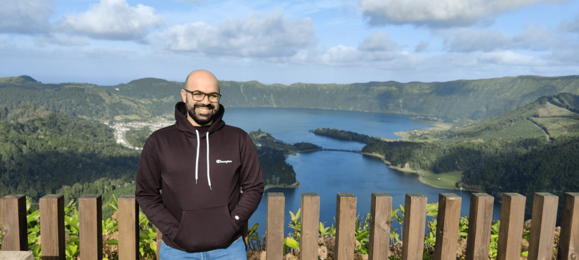 Tiago Silva posing for a picture on a lush green landscape.