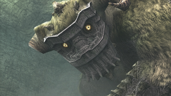 A Shadow of the Colossus screenshot shows a zoomed-in look at the masked face of the boss Quadratus.