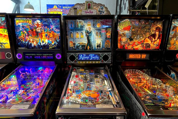 A photo shows The Addams Family alongside Monster Bash and Scared Stiff in a row of pinball games.