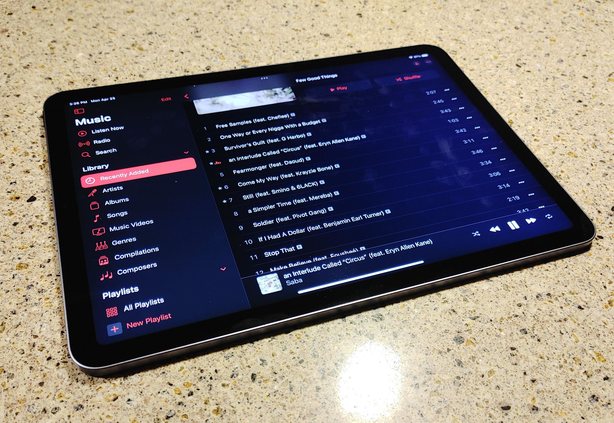 iPad Air open to the Music app, playing Saba's Few Good Things