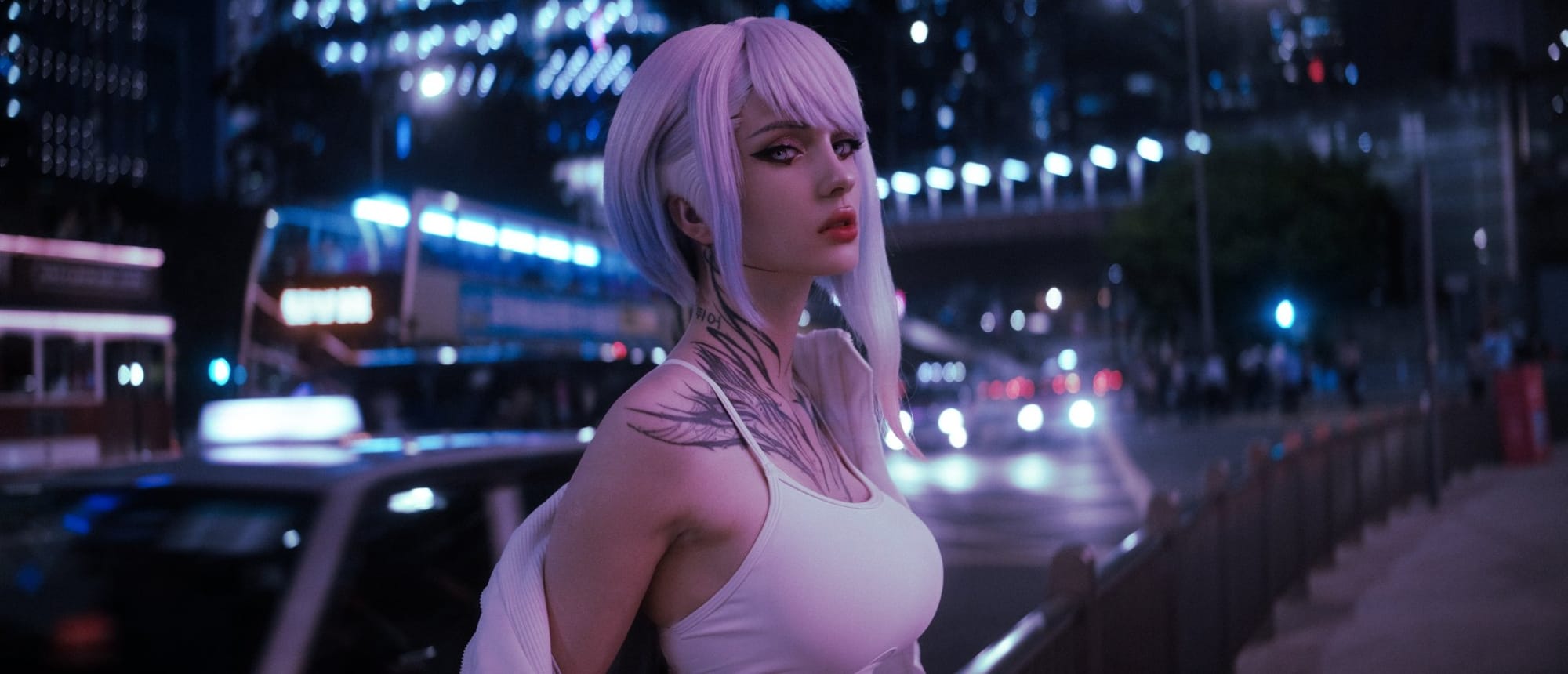Xenon_we as Lucy from Cyberpunk Edgerunners, lilac bob and white tank top, night street with neon traffic behind.