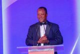 Yusuf Omari, Managing Director and CEO of Absa Bank Kenya, speaking at a podium during a corporate event.